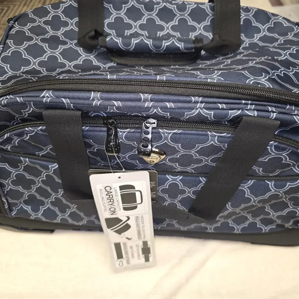 Calpak Plato duffel carry on bag with wheels in BNWT condition.